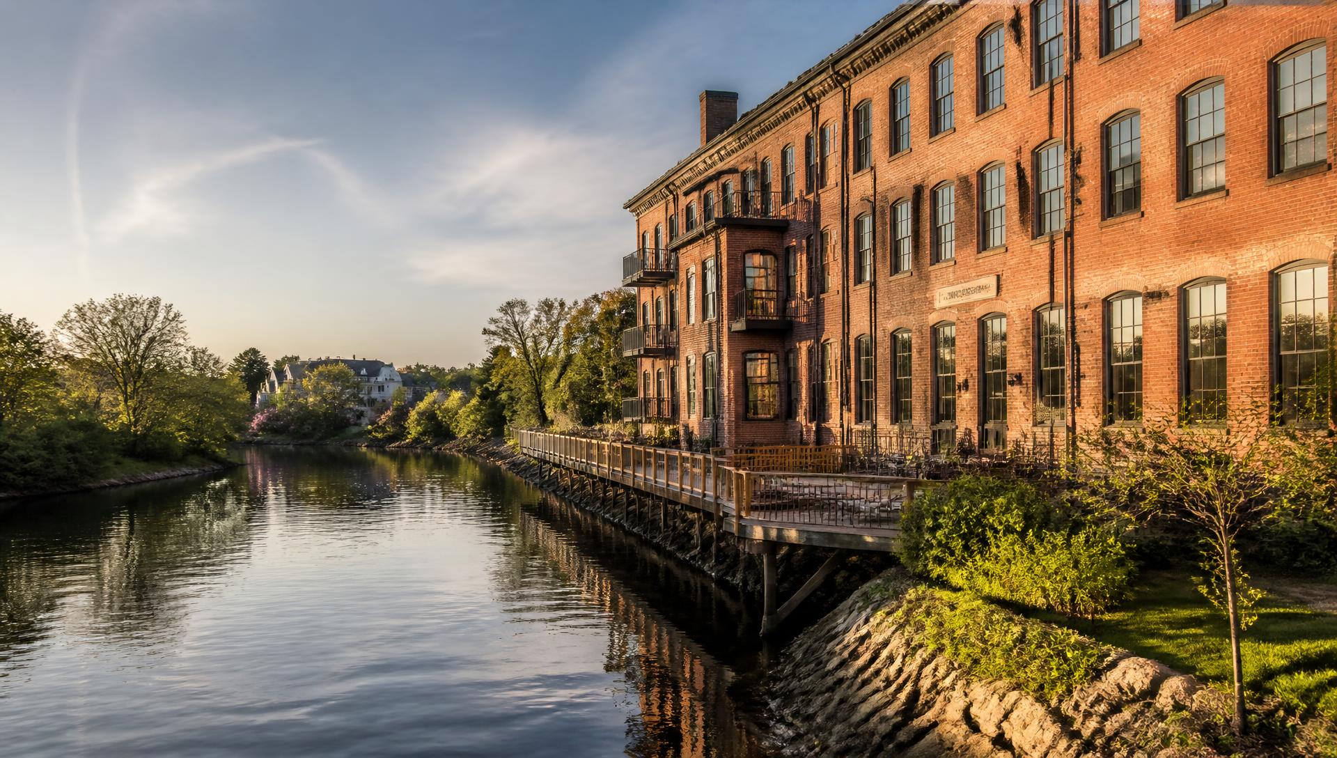 Renovated riverfront mill building at 7 Mill Street in Springvale, Maine